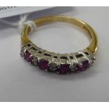 A 9ct gold claw set ruby and diamond half eternity ring 11