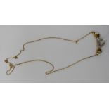 A 9ct gold conjoined, triple heart and diamond set necklet,