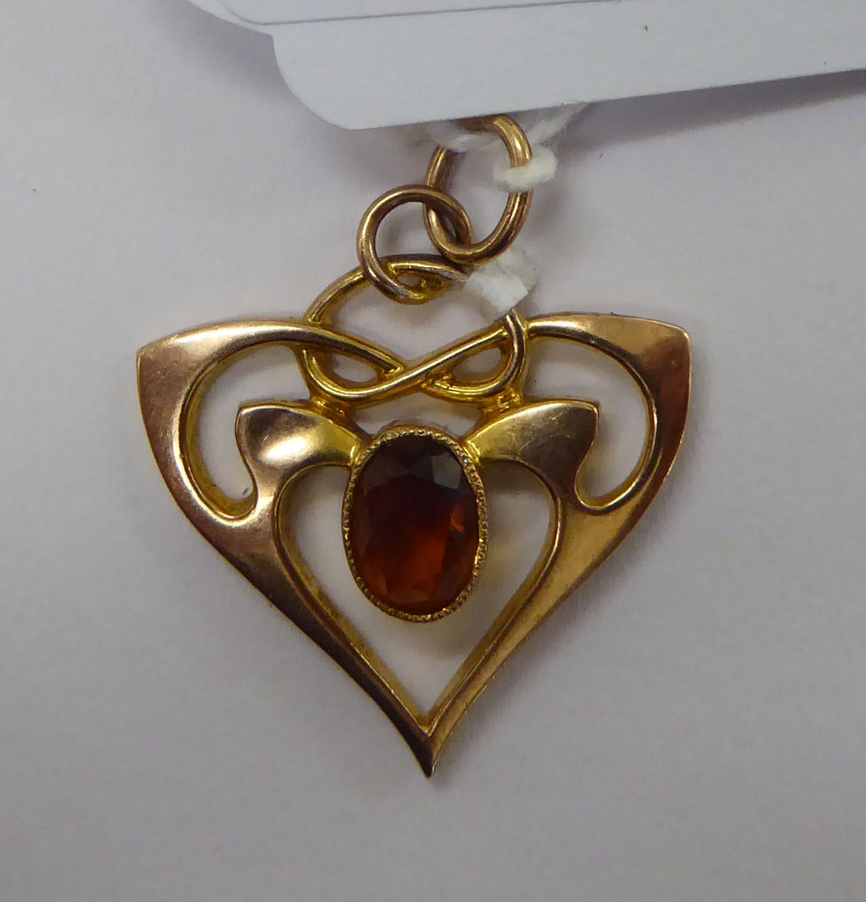 A 9ct gold Art Nouveau pendant,