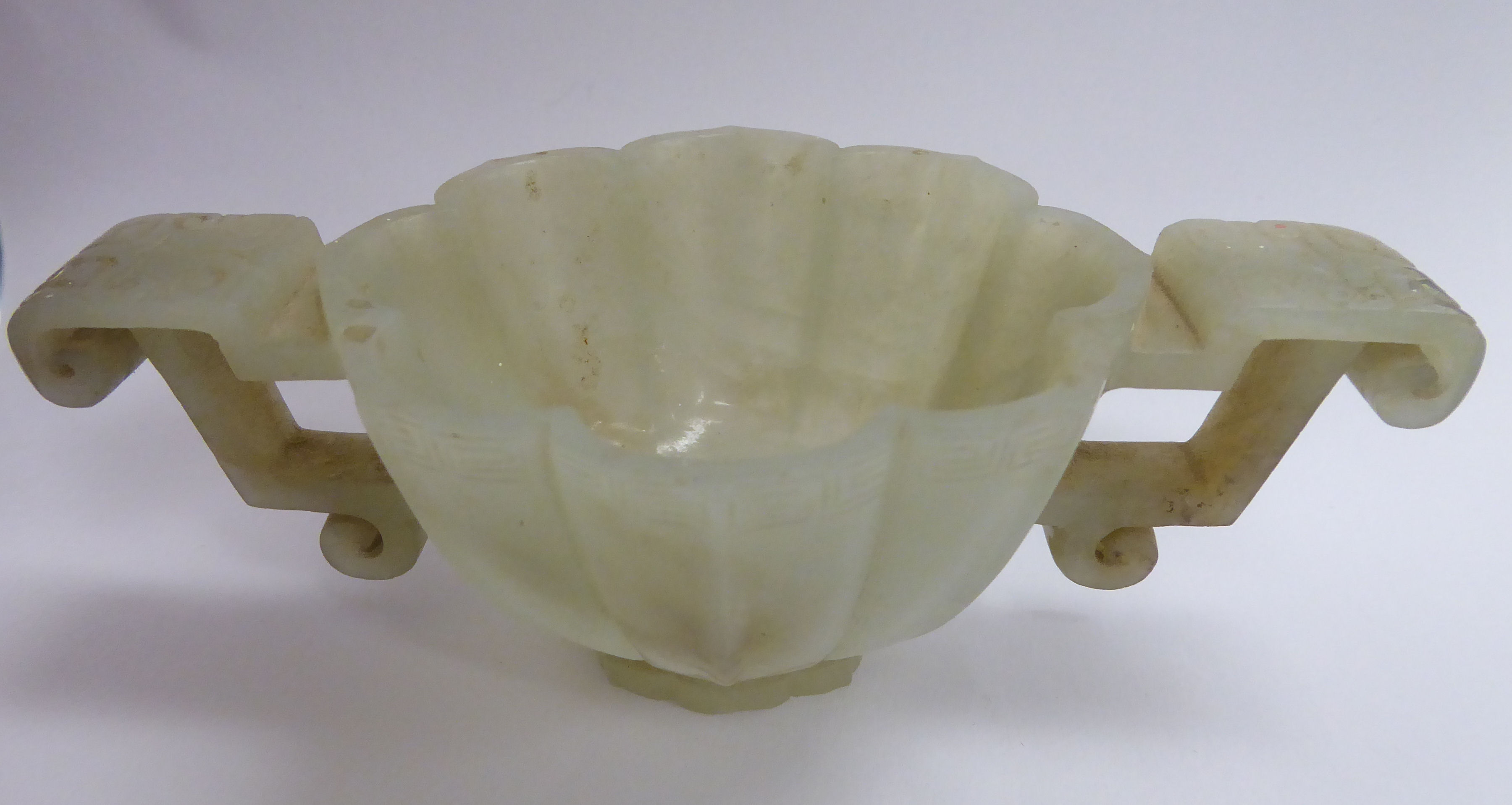 A modern carved jade libation cup with opposing C-scroll handles and engraved ornament 3''dia - Image 7 of 7