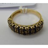 A 9ct gold half eternity ring,