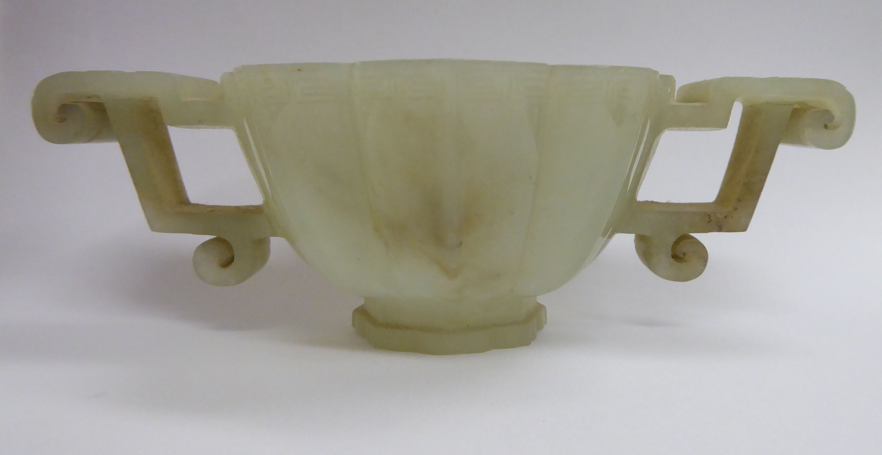 A modern carved jade libation cup with opposing C-scroll handles and engraved ornament 3''dia - Image 4 of 7