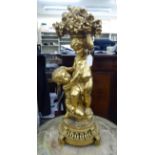 Cumberworth - a gilded metal table centrepiece, fashioned as two children fighting,