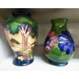 A Moorcroft pottery vase of baluster form, decorated with a landscape dated 2003 6.