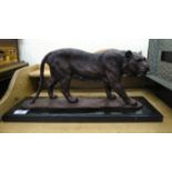 A modern cast and patinated bronze model, a prowling tiger,