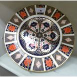 A Royal Crown Derby china plate, decorated in the Imari palette 10.