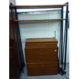 A 1960/70s teak modular wall unit with an arrangement of drawers, cupboards and shelves,