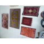 Five rugs: to include a Persian mat,