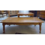 Two similar honey coloured oak coffee tables,