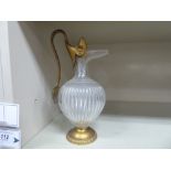 An early 20thC ovoid shape, reeded glass ewer with gilt metal mounts,