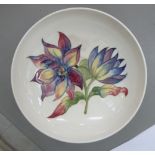 A Moorcroft pottery footed, shallow dish,