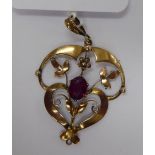 An 'antique' 9ct gold open framed pendant,