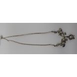 A silver and marcasite floral necklet,