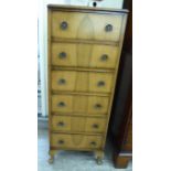 A mid 20thC mahogany finished six drawer tallboy,