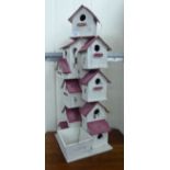 Modern painted softwood bird boxes,