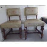 A pair of late Victorian oak framed hall chairs,