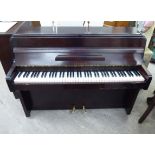 A Zender mahogany cased iron framed overstrung piano 40''h 51''w LAM