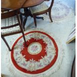 Five similar Chinese washed rugs: to include one on a pale blue ground 24'' x 38'' BSR