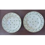 A pair of early 19thC French porcelain dishes, having wide, gilded rims,
