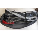 A matched set of fourteen steel and carbon shaft golf clubs,