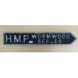 A modern painted softwood sign 'HMP Wormwood Scrubs' 5.5''h 31.