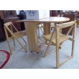 A modern beech drop leaf gateleg breakfast table,