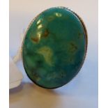 A silver and oval turquoise set dress ring 11