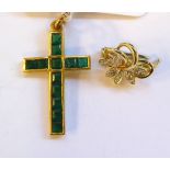 An 18ct gold and emerald set pendant cross 11