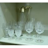 Early 20thC and later glassware: to include a set of seven Edwardian pedestal wines with etched