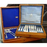 A set of twelve Mappin & Webb knives and forks, on mother-of-pearl handles,