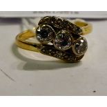 An 18ct gold crossover ring,