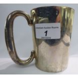 A silver tankard of tapered form with an ear shaped handle Birmingham 1920 11