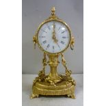 A late 19thC style cast gilt metal drum cased mantel timepiece with lion mask and ring handles,