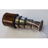 A 19thC Edsworth silver plated four draw spy glass with a turned walnut barrel