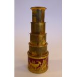 A 19thC gilt metal four draw spy glass, the barrel decorated in gilt,