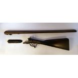 An E&G Higham side-by-side, double barrelled 12 bore pinfire shotgun with engraved ornament,