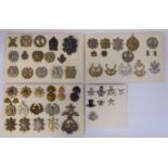 Approx forty-five military cap badges, some copies: to include The Tyneside Scottish,