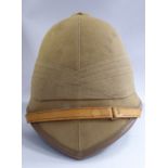 A 20thC British military style pith helmet