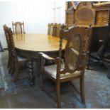 A 1920s/30s light oak dining suite, the wind-out table with rounded ends,