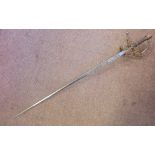 An 18thC Scottish sword with a basket hilt and a wrythen moulded, wire bound handgrip,