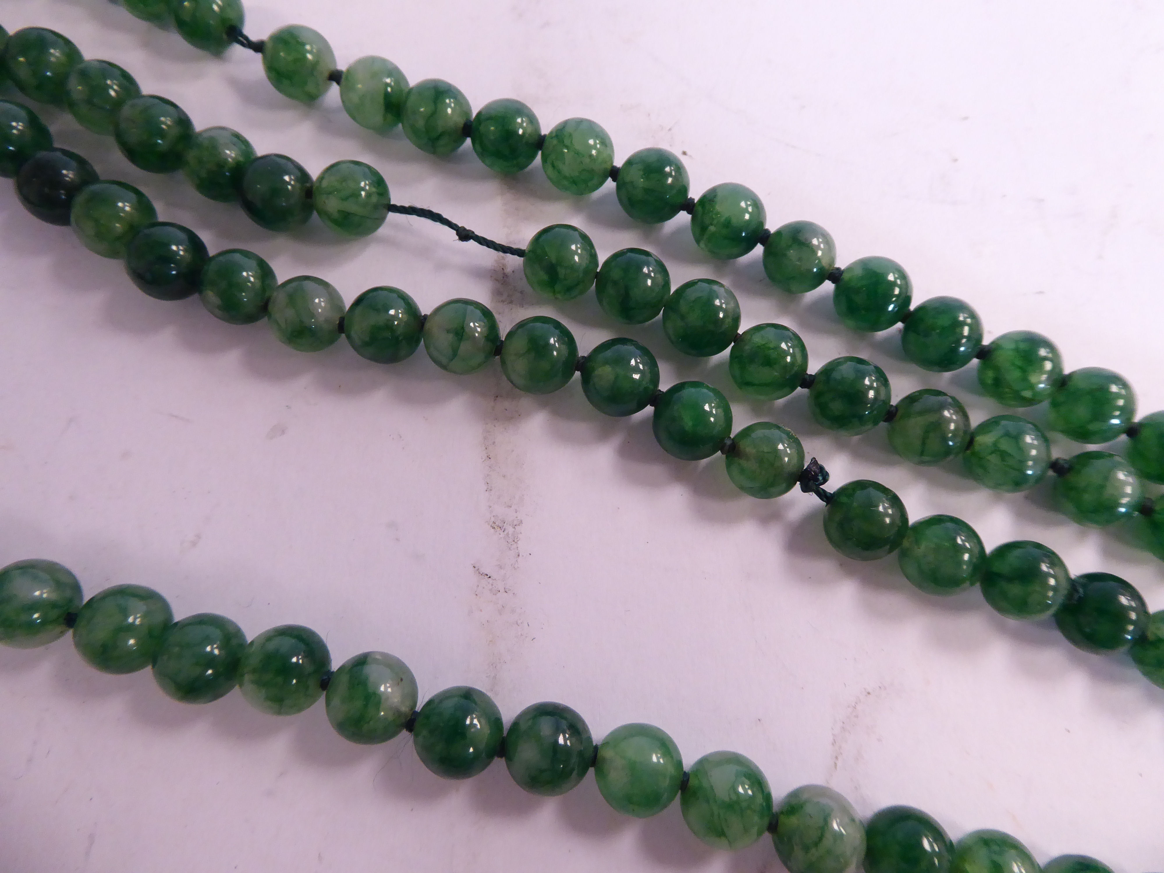 A Chinese uniform small round seaweed green jade bead necklace - Image 2 of 2