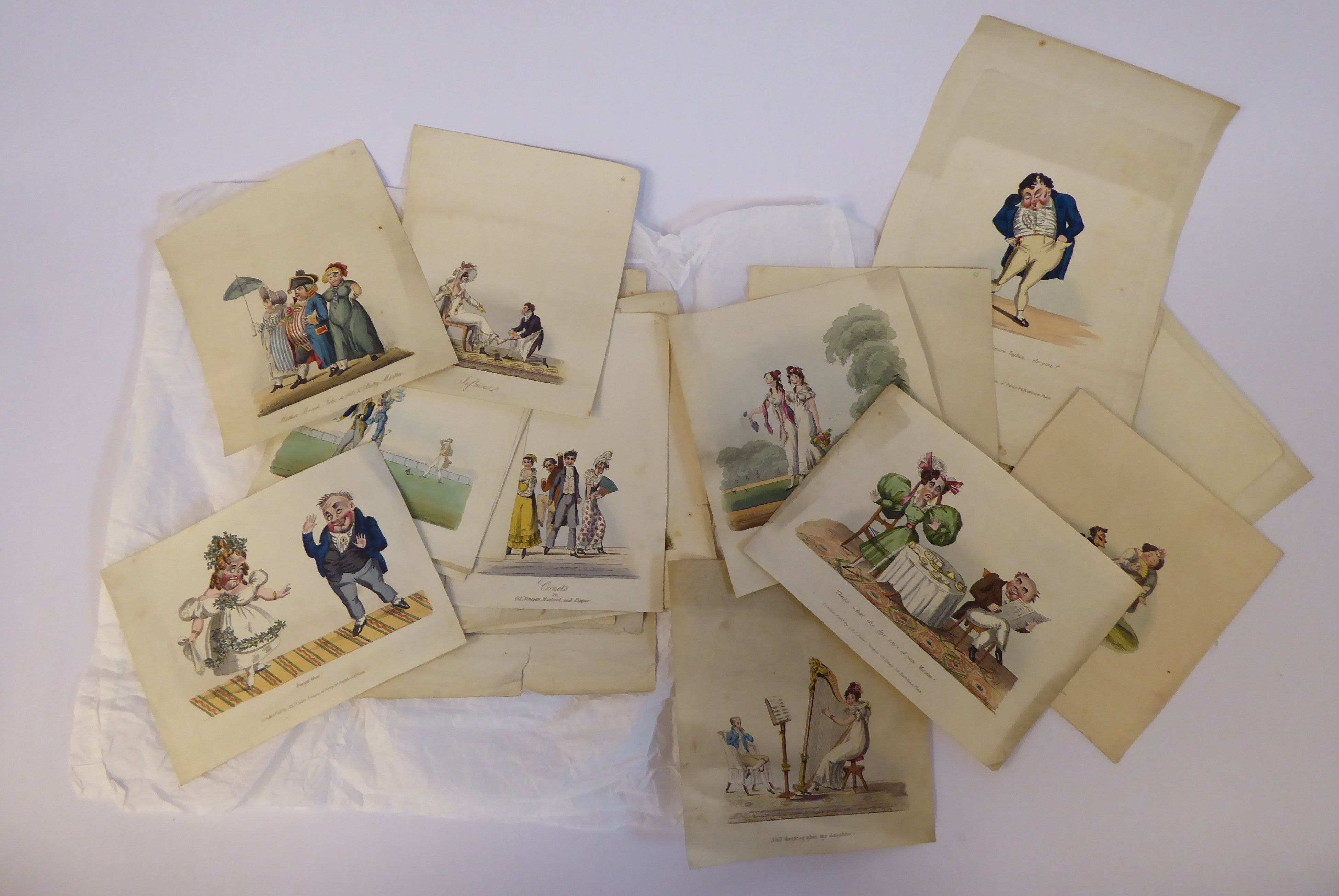 An uncollated folio collection of late 18th/mid 19thC coloured engravings, featuring cartoons,