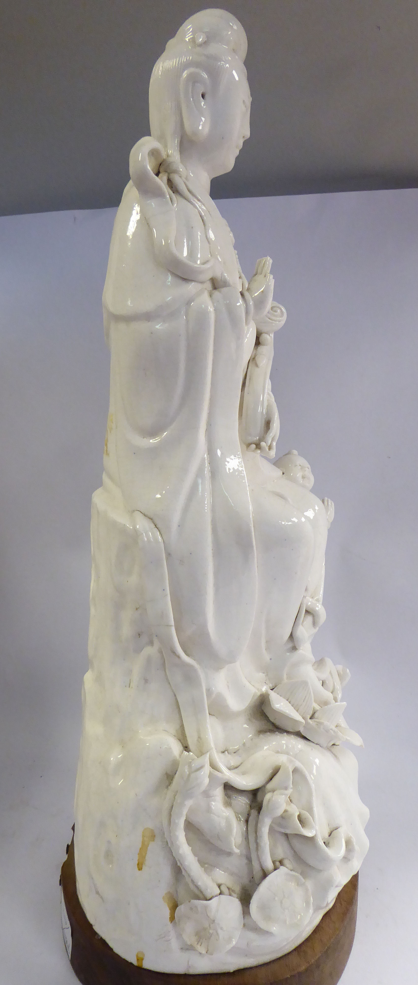 A late 18th/early 19thC Chinese blanc de chine porcelain figure Guan Yin seated, - Image 9 of 10