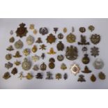 Approx fifty military cap badges, some copies: to include North Irish Horse,