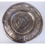 A late Victorian silver plated, broad rimmed charger/plaque,
