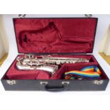 A Besson silver plated saxophone, in a fitted,