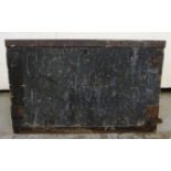 An early 20thC carpenter's stained pine workbox of boarded construction with iron reinforcement and