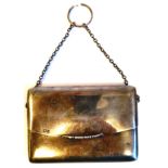 A lady's silver purse design card case, on a chain handle,