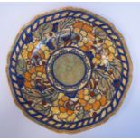 A Charlotte Rhead Crown Ducal pottery wavy edged plate,