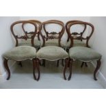 A set of six mid/late Victorian mahogany framed dining chairs,